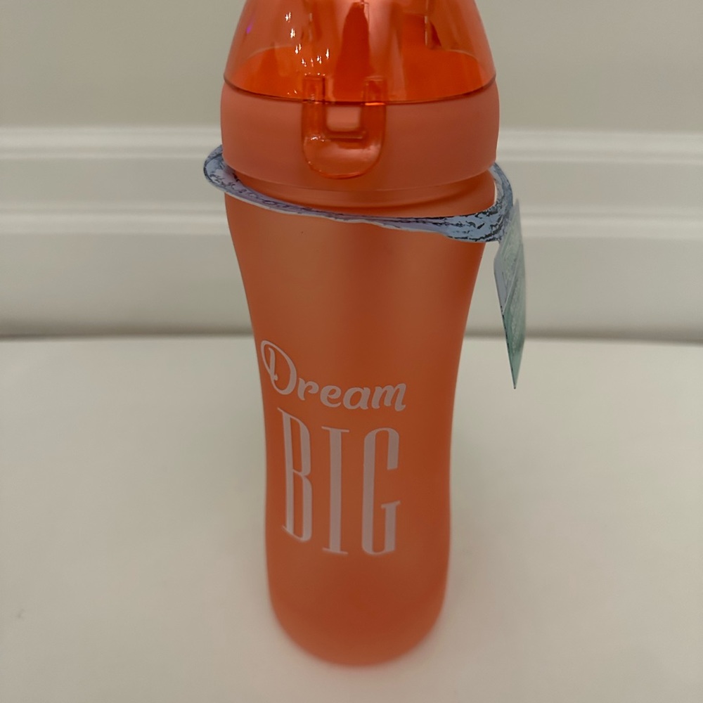Brand new glacia peach coloured plastic water bottle dream big